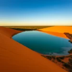 Dunas do Jalapão e fervedouro de água cristalina ao pôr do sol.