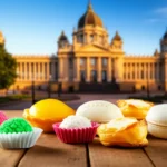 Doces de Pelotas com arquitetura histórica no fundo.