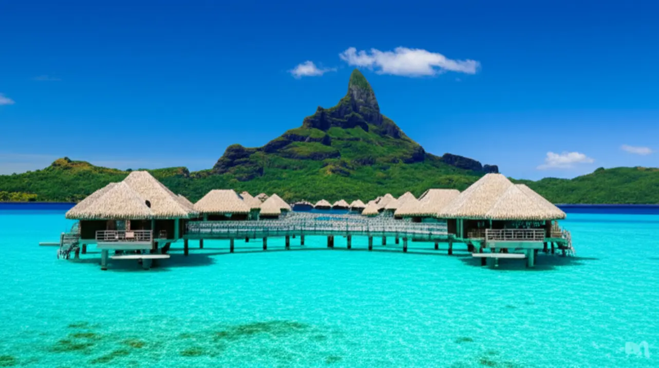 Bangalô sobre as águas em Bora Bora com o Monte Otemanu ao fundo.